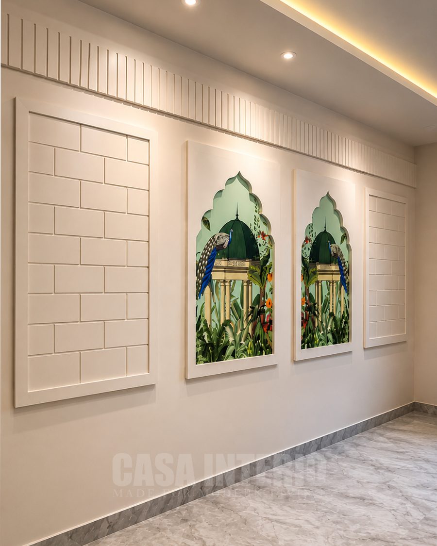 Panelled corridor wall with framed artwork