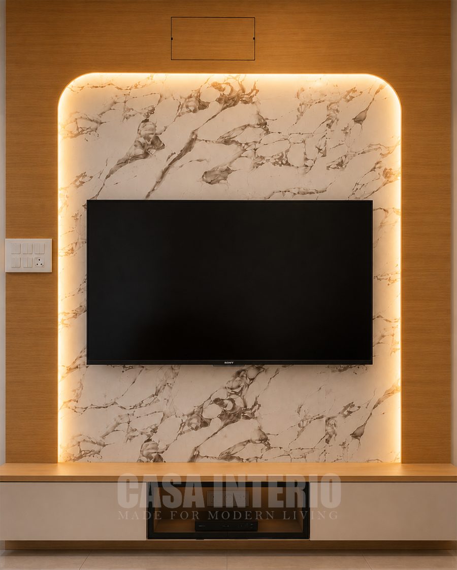 Backlit marble television panel framed in oak veneer